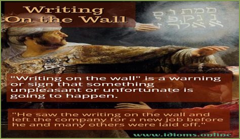 Which king saw the disembodied hand writing on the wall?